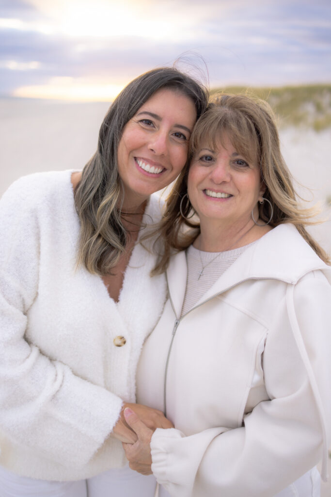 Grandmother with family during sunset beach portrait session