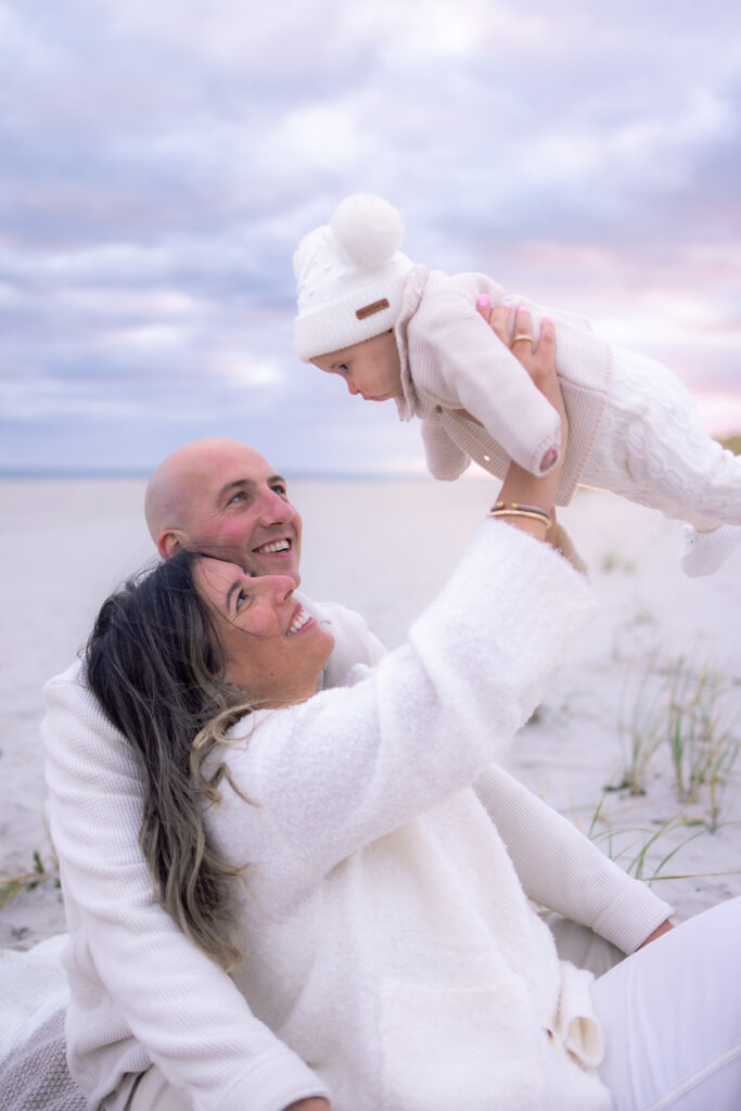 Sunset beach family portraits capturing timeless connection and emotion