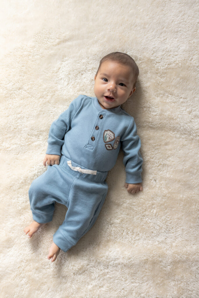 Newborn family photography session with parents at home in Central Florida