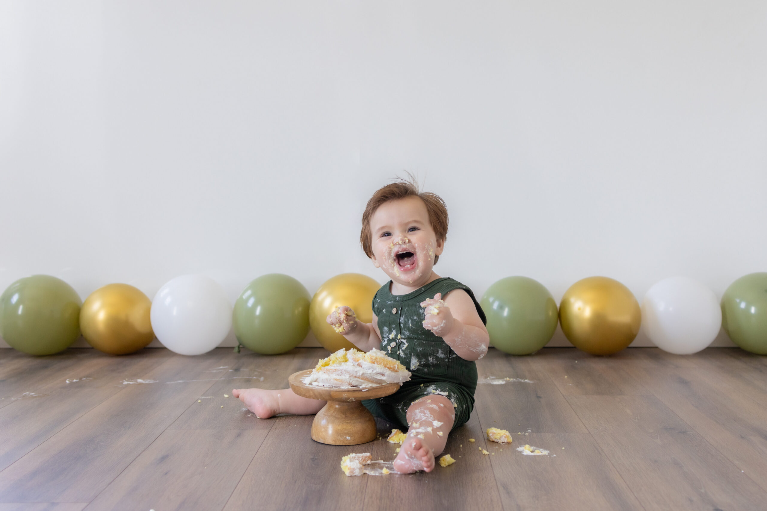 in-home birthday cake smash celebration with toddler son